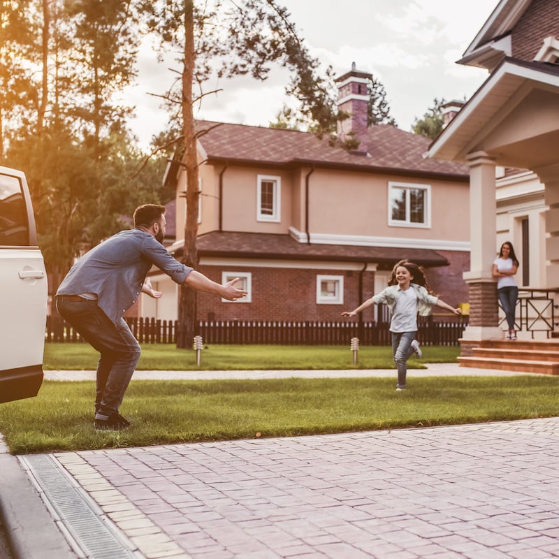 photo of little girl running to father