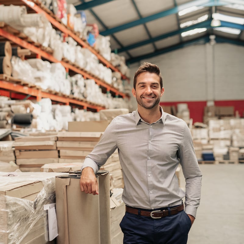 photo of business owner in warehouse setting